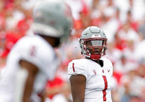 MADISON, WISCONSIN - SEPTEMBER 10: Cameron Ward #1 of the Washington State Cougars before the snap against the Wisconsin Badgers at Camp Randall Stadium on September 10, 2022 in Madison, Wisconsin. (Photo by John Fisher/Getty Images)