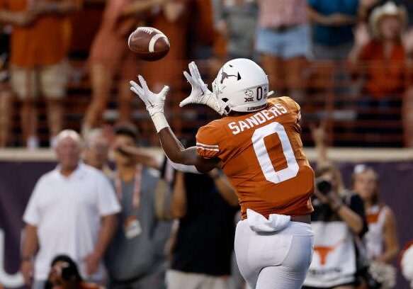 AUSTIN, TEXAS - OCTOBER 01: Ja'Tavion Sanders #0 of the Texas Longhorns catches a touchdown pass in the second quarter against the West Virginia Mountaineers at Darrell K Royal-Texas Memorial Stadium on October 01, 2022 in Austin, Texas. (Photo by Tim Warner/Getty Images)