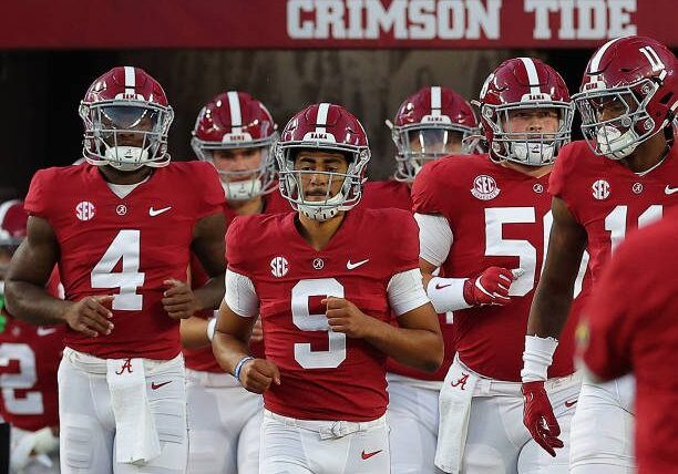 TUSCALOOSA, ALABAMA - OCTOBER 08:  Bryce Young #9 of the Alabama Crimson Tide leads the team onto the field during pregame warmups prior to facing the Texas A&amp;M Aggies at Bryant-Denny Stadium on October 08, 2022 in Tuscaloosa, Alabama. (Photo by Kevin C. Cox/Getty Images)