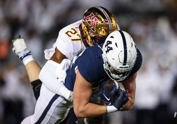 STATE COLLEGE, PA - OCTOBER 22: Tyler Warren #44 of the Penn State Nittany Lions catches a pass for a touchdown against Tyler Nubin #27 of the Minnesota Golden Gophers during the first half at Beaver Stadium on October 22, 2022 in State College, Pennsylvania. (Photo by Scott Taetsch/Getty Images)