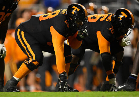 KNOXVILLE, TENNESSEE - OCTOBER 29: Darnell Wright #58 and Javontez Spraggins #76 of the Tennessee Volunteers line up for a third quarter snap against the Kentucky Wildcats at Neyland Stadium on October 29, 2022 in Knoxville, Tennessee. (Photo by Eakin Howard/Getty Images)
