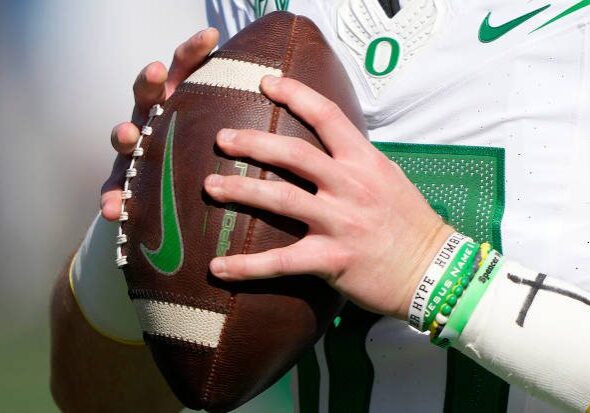 BERKELEY, CALIFORNIA - OCTOBER 29: A detailed viewo of the Nike football used by quarterback Bo Nix #10 of the Oregon Ducks while warming up prior to playing the California Golden Bears in a NCAA football game at FTX Field at California Memorial Stadium on October 29, 2022 in Berkeley, California. (Photo by Thearon W. Henderson/Getty Images)