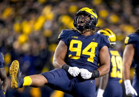 ANN ARBOR, MICHIGAN - OCTOBER 29: Kris Jenkins #94 of the Michigan Wolverines reacts against the Michigan State Spartans during the fourth quarter at Michigan Stadium on October 29, 2022 in Ann Arbor, Michigan. (Photo by Nic Antaya/Getty Images)