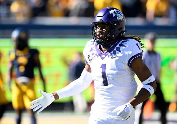 MORGANTOWN, WEST VIRGINIA - OCTOBER 29: Quentin Johnston #1 of the TCU Horned Frogs celebrates after scoring a touchdown against the West Virginia Mountaineers at Mountaineer Field on October 29, 2022 in Morgantown, West Virginia. (Photo by G Fiume/Getty Images)