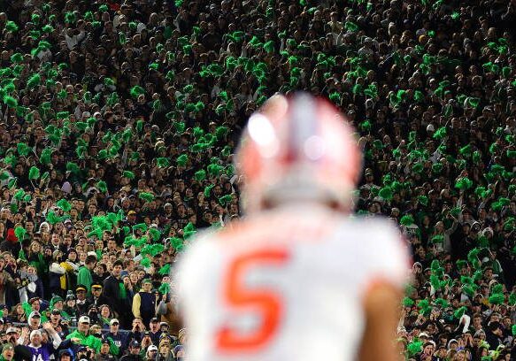 SOUTH BEND, INDIANA - NOVEMBER 05: Fans look on as DJ Uiagalelei #5 of the Clemson Tigers waits to snap the ball against the Notre Dame Fighting Irish during the second half at Notre Dame Stadium on November 05, 2022 in South Bend, Indiana. (Photo by Michael Reaves/Getty Images)