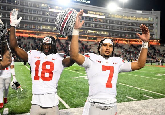 COLLEGE PARK, MARYLAND - NOVEMBER 19: Marvin Harrison Jr. #18 and C.J. Stroud #7 of the Ohio State Buckeyes celebrate a victory against the Maryland Terrapins at SECU Stadium on November 19, 2022 in College Park, Maryland. (Photo by G Fiume/Getty Images)