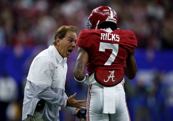 NEW ORLEANS, LOUISIANA - DECEMBER 31: Head coach Nick Saban of the Alabama Crimson Tide talks with Eli Ricks #7 of the Alabama Crimson Tide during the Allstate Sugar Bowl at Caesars Superdome on December 31, 2022 in New Orleans, Louisiana. (Photo by Chris Graythen/Getty Images)