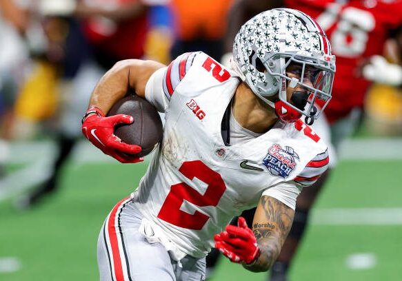 ATLANTA, GEORGIA - DECEMBER 31: Emeka Egbuka #2 of the Ohio State Buckeyes rushes during the third quarter against the Georgia Bulldogs in the Chick-fil-A Peach Bowl at Mercedes-Benz Stadium on December 31, 2022 in Atlanta, Georgia. (Photo by Kevin C. Cox/Getty Images)