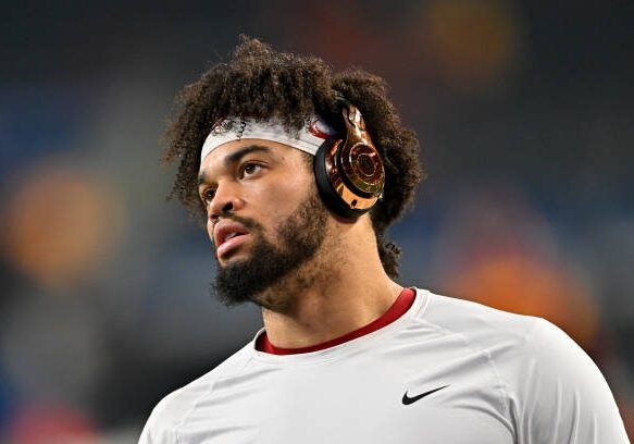 ARLINGTON, TEXAS - JANUARY 02: Quarterback Caleb Williams #13 of the USC Trojans looks on before the Goodyear Cotton Bowl Classic football game against the Tulane Green Wave at AT&amp;T Stadium on January 02, 2023 in Arlington, Texas. (Photo by Alika Jenner/Getty Images)