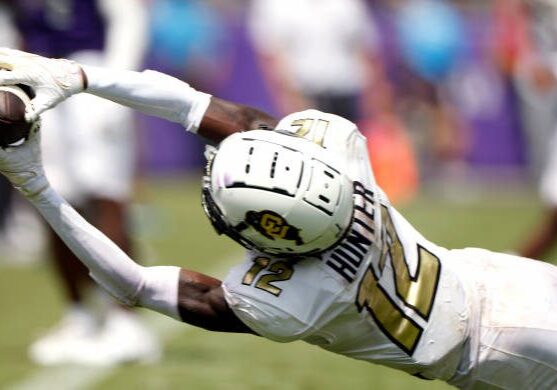 FORT WORTH, TX - SEPTEMBER 2: Travis Hunter #12 of the Colorado Buffaloes dives for a pass against the TCU Horned Frogs during the first half at Amon G. Carter Stadium on September 2, 2023 in Fort Worth, Texas. (Photo by Ron Jenkins/Getty Images)