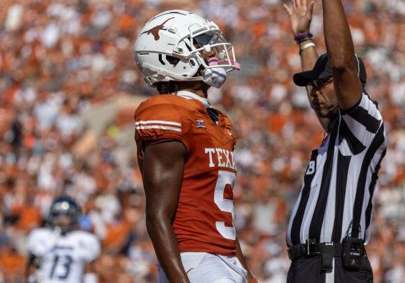 AUSTIN, TX - SEPTEMBER 02: Texas Longhorns wide receiver Adonai Mitchell (5) celebrates his touchdown catch during the college football game between Texas Longhorns and Rice Owls on September 2, 2023, at Darrell K Royal-Texas Memorial Stadium in Austin, TX.  (Photo by David Buono/Icon Sportswire via Getty Images)