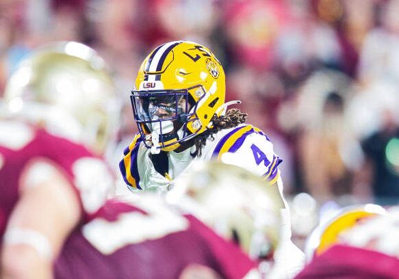 ORLANDO, FL - SEPTEMBER 03: LSU Tigers linebacker Harold Perkins Jr. (4) lines up for a play during the Camping World Kickoff Game between the LSU Tigers and the Florida State Seminoles on September 03, 2023, at Camping World Stadium in Orlando, FL. (Photo by John Korduner/Icon Sportswire via Getty Images)