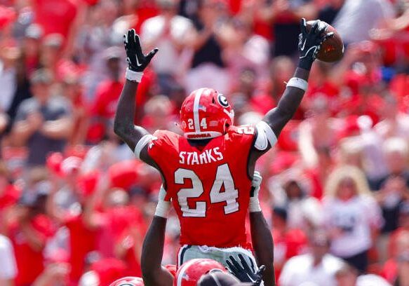 ATHENS, GEORGIA - SEPTEMBER 9: Malaki Starks #24 of the Georgia Bulldogs reacts after an interception during the second quarter against the Ball State Cardinals at Sanford Stadium on September 9, 2023 in Athens, Georgia. (Photo by Todd Kirkland/Getty Images)