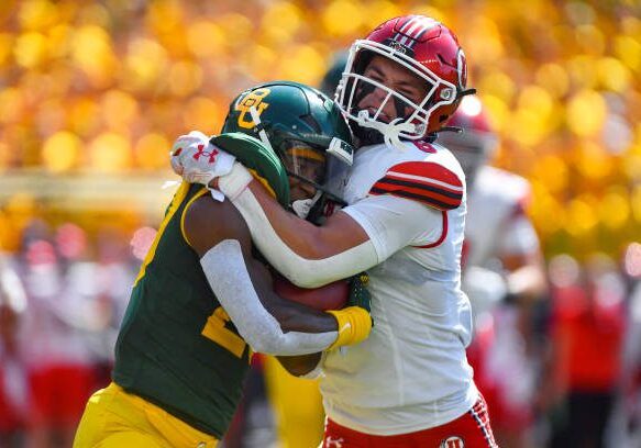 WACO, TX - SEPTEMBER 09: Utah Utes safety Cole Bishop (right) wraps up Baylor Bears running back Richard Reese (left) during the first quarter of a college football game between the Utah Utes and Baylor Bears on Saturday, September 09, 2023 at McLane Stadium in Waco, TX. (Photo by Austin McAfee/Icon Sportswire via Getty Images)