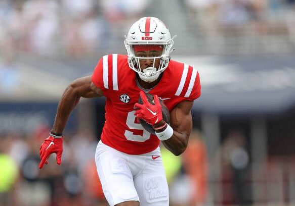 OXFORD, MISSISSIPPI - SEPTEMBER 02: Tre Harris #9 of the Mississippi Rebels carries the ball during the game against the Mercer Bears at Vaught-Hemingway Stadium on September 02, 2023 in Oxford, Mississippi. (Photo by Justin Ford/Getty Images)