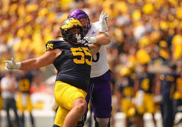 College Football: Michigan lineman Mason Graham (55) in action, rushes up field vs East Carolina during game played at Michigan Stadium.
Ann Arbor, MI 9/2/2023 
CREDIT: Erick W. Rasco (Photo by Erick W. Rasco/Sports Illustrated via Getty Images) 
(Set Number: X164411 TK1)