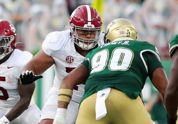 gettyimages-1670534448-612x612 TAMPA, FL - SEPTEMBER 16: Alabama Lineman Kadyn Proctor (74) pass blocks during the College Football game between the Alabama Crimson Tide and the South Florida Bulls on September 16, 2023 at Raymond James Stadium in Tampa, FL. (Photo by Cliff Welch/Icon Sportswire via Getty Images)