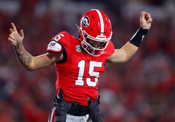 ATHENS, GEORGIA - SEPTEMBER 23: Carson Beck #15 of the Georgia Bulldogs reacts after scoring a touchdown during the third quarter against the UAB Blazers at Sanford Stadium on September 23, 2023 in Athens, Georgia. (Photo by Todd Kirkland/Getty Images)