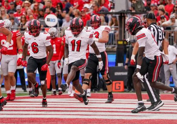 COLUMBUS, OHIO - SEPTEMBER 16: Malachi Corley #11 of the Western Kentucky Hilltoppers celebrates with teammates after scoring a touchdown in the second quarter against the Ohio State Buckeyes at Ohio Stadium on September 16, 2023 in Columbus, Ohio. (Photo by Dylan Buell/Getty Images)