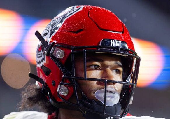CHARLOTTESVILLE, VIRGINIA - SEPTEMBER 22: Kevin KC Concepcion #10 of the NC State Wolfpack runs for a touchdown in the second half during a game against the Virginia Cavaliers at Scott Stadium on September 22, 2023 in Charlottesville, Virginia. (Photo by Ryan M. Kelly/Getty Images)