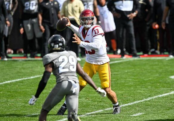 BOULDER, CO - SEPTEMBER 30:  Quarterback Caleb Williams #13 of the USC Trojans passes for a third quarter touchdown against the Colorado Buffaloes at Folsom Field on September 30, 2023 in Boulder, Colorado. (Photo by Dustin Bradford/Getty Images)