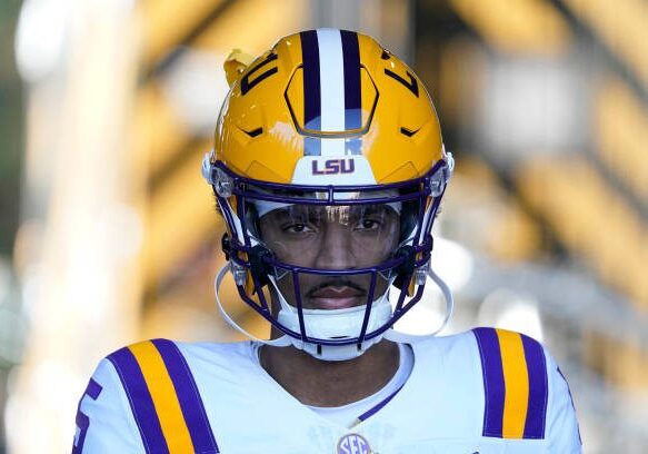 COLUMBIA, MISSOURI - OCTOBER 07: Quarterback Jayden Daniels #5 of the LSU Tigers waits to take to the field prior to a game against the Missouri Tigers at Faurot Field/Memorial Stadium on October 07, 2023 in Columbia, Missouri. (Photo by Ed Zurga/Getty Images)