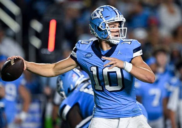 CHAPEL HILL, NORTH CAROLINA - OCTOBER 14: Drake Maye #10 of the North Carolina Tar Heels looks to pass against the Miami Hurricanes during their game at Kenan Memorial Stadium on October 14, 2023 in Chapel Hill, North Carolina. The Tar Heels won 41-31. (Photo by Grant Halverson/Getty Images)