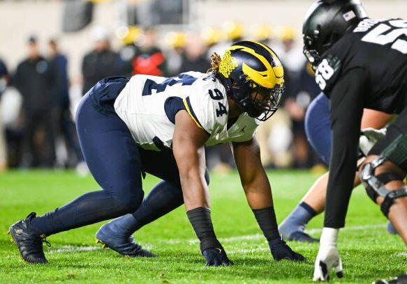 EAST LANSING, MI - OCTOBER 21: Michigan Wolverines defensive tackle Kris Jenkins (94) lines up for a snap during a college football game between the Michigan State Spartans and Michigan Wolverines on October 21, 2023 at Spartan Stadium in East Lansing, MI. (Photo by Adam Ruff/Icon Sportswire via Getty Images)