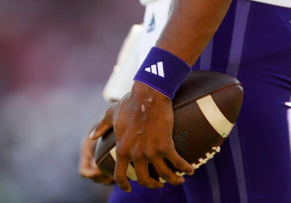 STANFORD, CALIFORNIA - OCTOBER 28: Detail view of an Adidas wristband worn by Michael Penix Jr. #9 of the Washington Huskies during a game against the Stanford Cardinal at Stanford Stadium on October 28, 2023 in Stanford, California. (Photo by Brandon Sloter/Image Of Sport/Getty Images)