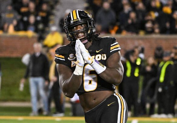 COLUMBIA, MO - NOVEMBER 11: Missouri Tigers defensive lineman Darius Robinson (6) motions thank you to the Tennessee sideline after a sack during a SEC conference game between the Tennessee Volunteers and the Missouri Tigers held on Saturday Nov 11, 2023 at Faurot Field at Memorial Stadium in Columbia MO. (Photo by Rick Ulreich/Icon Sportswire via Getty Images