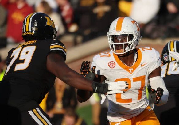 COLUMBIA, MO - NOVEMBER 11: Tennessee Volunteers defensive lineman James Pearce Jr. (27) rushes against Missouri Tigers offensive lineman Armand Membou (79) in the second quarter of an SEC football game between the Tennessee Volunteers and Missouri Tigers on Nov 11, 2023 at Memorial Stadium in Columbia, MO. (Photo by Scott Winters/Icon Sportswire via Getty Images)