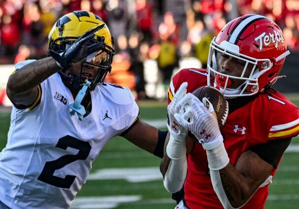 COLLEGE PARK, MD - NOVEMBER 18:   Maryland Terrapins wide receiver Kaden Prather (1) makes a reception against Michigan Wolverines defensive back Will Johnson (2) during the Michigan Wolverines game versus the Maryland Terrapins on November 18, 2023 at SECU Stadium in College Park, MD. (Photo by Mark Goldman/Icon Sportswire via Getty Images)