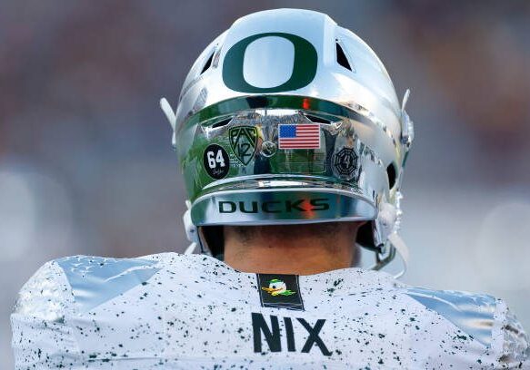 TEMPE, ARIZONA - NOVEMBER 18: Detail view of the helmet and uniform of Bo Nix #10 of the Oregon Ducks during a game against the Arizona State Sun Devils at Mountain America Stadium on November 18, 2023 in Tempe, Arizona. (Photo by Brandon Sloter/Image Of Sport/Getty Images)