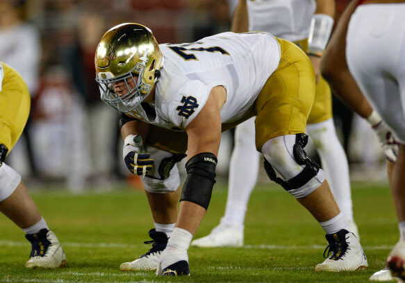 STANFORD, CALIFORNIA - NOVEMBER 25: Joe Alt #76 of the Notre Dame Fighting Irish at the line of scrimmage in the second half during a game against the Stanford Cardinal at Stanford Stadium on November 25, 2023 in Stanford, California. (Photo by Brandon Sloter/Image Of Sport/Getty Images)
