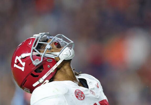 AUBURN, ALABAMA - NOVEMBER 25:  Isaiah Bond #17 of the Alabama Crimson Tide reacts after pulling in the game-winning touchdown against the Auburn Tigers during the fourth quarter at Jordan-Hare Stadium on November 25, 2023 in Auburn, Alabama. (Photo by Kevin C. Cox/Getty Images)