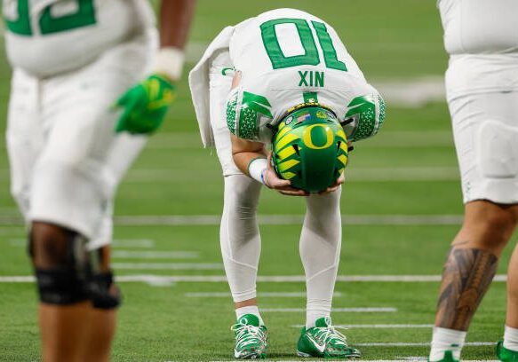 LAS VEGAS, NEVADA - DECEMBER 1: Bo Nix #10 of the Oregon Ducks reacts in the second half during the Pac-12 Championship game against the Washington Huskies at Allegiant Stadium on December 1, 2023 in Las Vegas, Nevada. (Photo by Brandon Sloter/Image Of Sport/Getty Images)