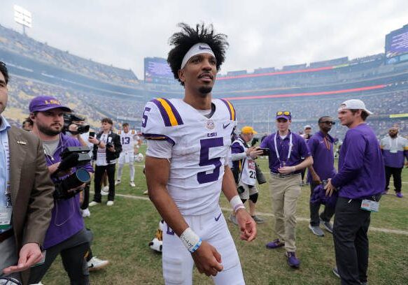 BATON ROUGE, LOUISIANA - NOVEMBER 25: Jayden Daniels #5 of the LSU Tigers reacts against the Texas A&amp;M Aggies after a game at Tiger Stadium on November 25, 2023 in Baton Rouge, Louisiana. (Photo by Jonathan Bachman/Getty Images)