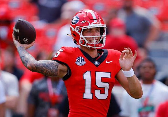 ATHENS, GEORGIA - SEPTEMBER 7: Carson Beck #15 of the Georgia Bulldogs warms up prior to the game against the Tennessee Tech Golden Eagles at Sanford Stadium on September 7, 2024 in Athens, Georgia. (Photo by Todd Kirkland/Getty Images)