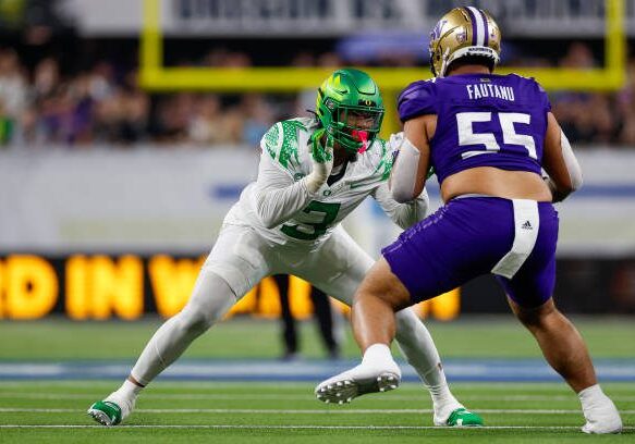 LAS VEGAS, NEVADA - DECEMBER 1: Brandon Dorlus #3 of the Oregon Ducks works against Troy Fautanu #55 of the Washington Huskies in the second half during the Pac-12 Championship game at Allegiant Stadium on December 1, 2023 in Las Vegas, Nevada. (Photo by Brandon Sloter/Image Of Sport/Getty Images)
