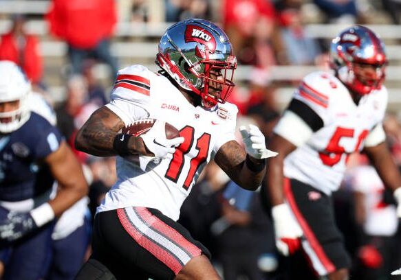 CHARLOTTE, NORTH CAROLINA - DECEMBER 18: Malachi Corley #11 of the Western Kentucky Hilltoppers runs the ball against the Old Dominion Monarchs during the first half of the Famous Toastery Bowl at Jerry Richardson Stadium on December 18, 2023 in Charlotte, North Carolina. (Photo by Isaiah Vazquez/Getty Images)