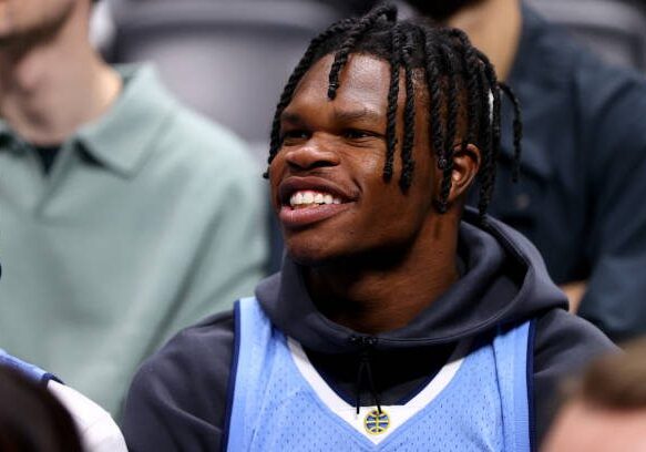 DENVER, COLORADO - DECEMBER 25: Travis Hunter of the Colorado Buffaloes football team watches the action between the Denver Nuggets and the Golden State Warriors at Ball Arena on December 25, 2023 in Denver, Colorado. NOTE TO USER: User expressly acknowledges and agrees that, by downloading and/or using this Photograph, user is consenting to the terms and conditions of the Getty Images License Agreement. (Photo by Jamie Schwaberow/Getty Images)