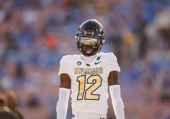 PASADENA, CALIFORNIA - OCTOBER 28: Travis Hunter #12 of the Colorado Buffaloes looks on prior to a game against the UCLA Bruins at Rose Bowl Stadium on October 28, 2023 in Pasadena, California. (Photo by Ryan Kang/Getty Images)