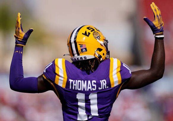 TAMPA, FL - JANUARY 01: LSU Tigers wide receiver Brian Thomas Jr. (11) celebrates during the ReliaQuest Bowl against the Wisconsin Badgers on January 1, 2024 at Raymond James Stadium in Tampa, Florida. (Photo by Joe Robbins/Icon Sportswire via Getty Images)