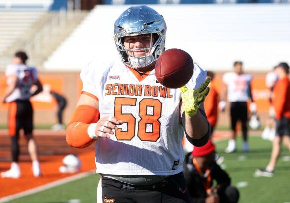 MOBILE, AL - JANUARY 31: National offensive lineman Jackson Powers-Johnson of Oregon (58) during the National team practice for the Reese's Senior Bowl on January 31, 2024 at Hancock Whitney Stadium in Mobile, Alabama.  (Photo by Michael Wade/Icon Sportswire via Getty Images)