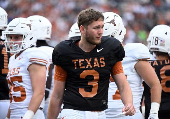 AUSTIN, TX - APRIL 20: Texas Longhorns QB Quinn Ewers watches action from the sidelines during the Orange-White spring football game on April 20, 2024, at Darrell K Royal-Texas Memorial Stadium in Austin, TX. (Photo by John Rivera/Icon Sportswire via Getty Images)