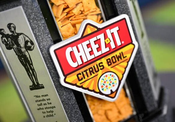 INDIANAPOLIS, IN - JULY 23: The Cheez-It Citrus Bowl trophy sits on display during the 2024 Big Ten Media Days on July 23, 2024 at Lucas Oil Stadium in Indianapolis, IN. (Photo by James Black/Icon Sportswire via Getty Images)