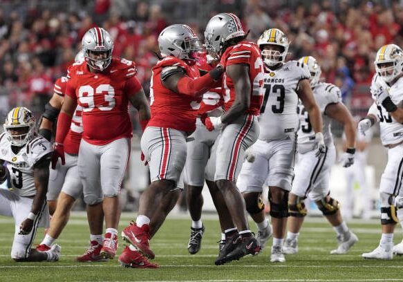 COLUMBUS, OHIO - SEPTEMBER 07: Defensive lineman Kayden McDonald #98 and Linebacker Arvell Reese #20 of the Ohio State Buckeyes reacts to a play during the game against the Western Michigan Broncos at Ohio Stadium on September 07, 2024 in Columbus, Ohio. (Photo by Jason Mowry/Getty Images)