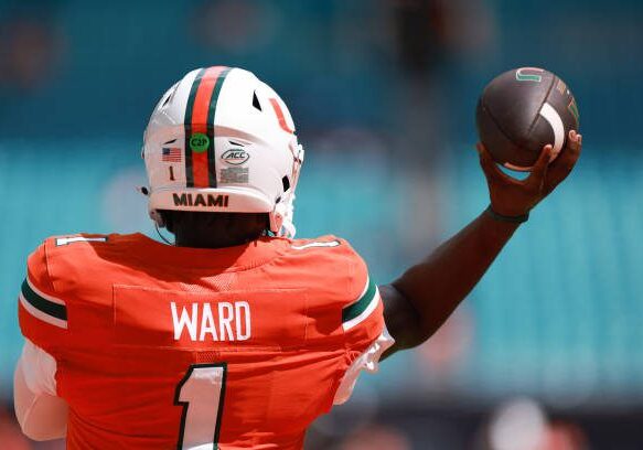 MIAMI GARDENS, FLORIDA - SEPTEMBER 14: Quarterback Cam Ward #1 of the Miami Hurricanes warms up prior to facing Ball State Cardinals at Hard Rock Stadium on September 14, 2024 in Miami Gardens, Florida. (Photo by Carmen Mandato/Getty Images)