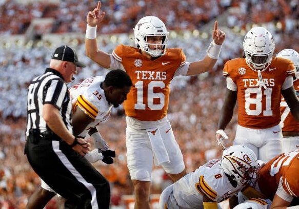 gettyimages-2173626580-612x612 AUSTIN, TEXAS - SEPTEMBER 21: Arch Manning #16 of the Texas Longhorns reacts after a rushing touchdown in the first quarter against the Louisiana Monroe Warhawks at Darrell K Royal-Texas Memorial Stadium on September 21, 2024 in Austin, Texas. (Photo by Tim Warner/Getty Images)