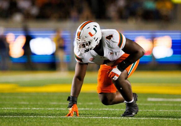 BERKELEY, CALIFORNIA - OCTOBER 5: Rueben Bain Jr. #4 of the Miami Hurricanes in a defensive stance during the first half against California Golden Bears at California Memorial Stadium on October 5, 2024 in Berkeley, California. (Photo by Ric Tapia/Getty Images)